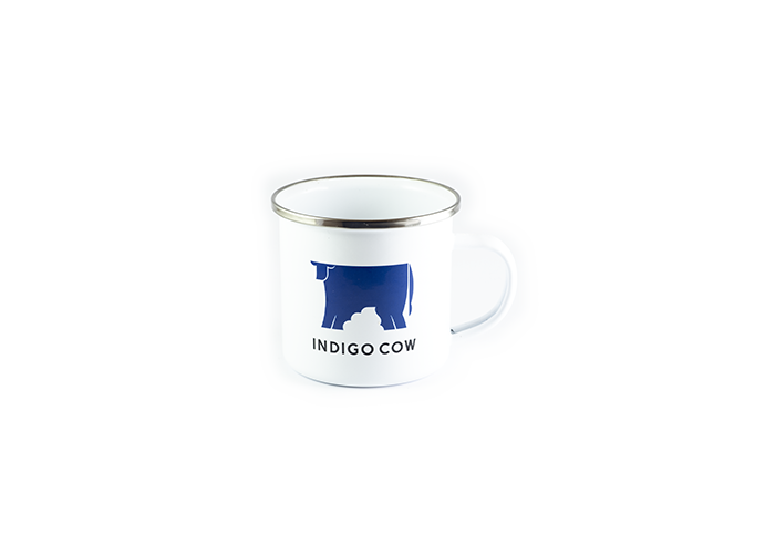 Photo of mug with the Indigo Cow logo